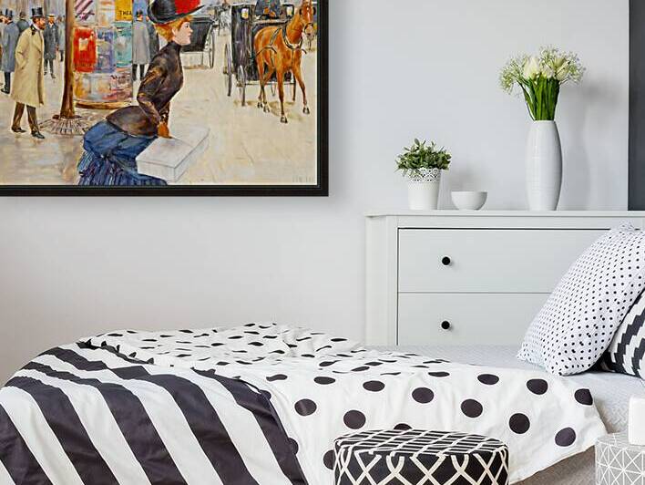 woman carrying box by Row One Brand