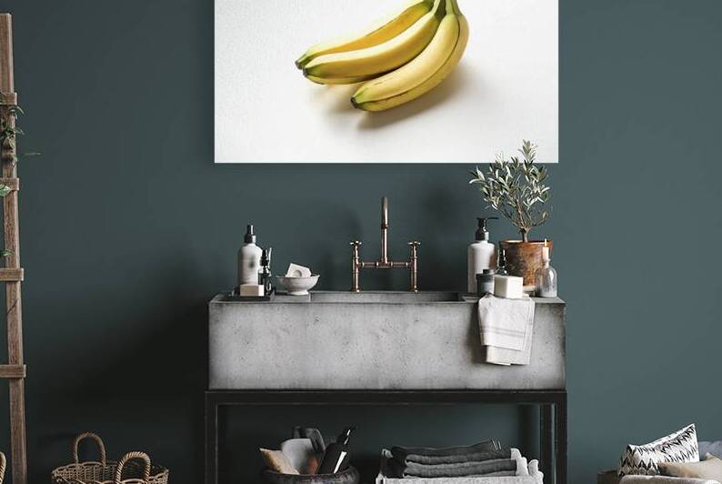 fresh bananas on white background 2 by Romeu Hurmuzache