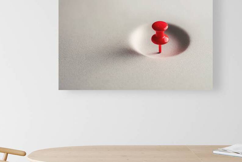 A red push pin or thumbtack standing upright on a by Gheorghe Stanescu