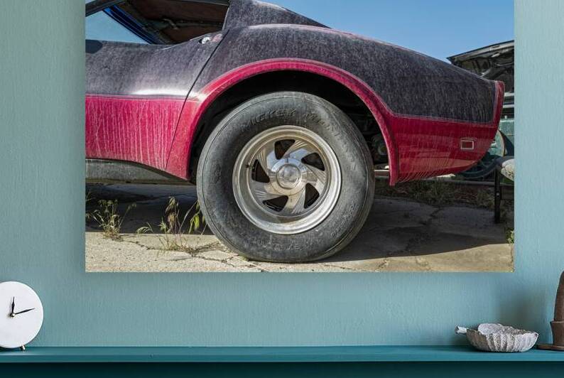 A Mickey Thompson GT Stingray tire on the rear of an old Corvette by David Reinhold