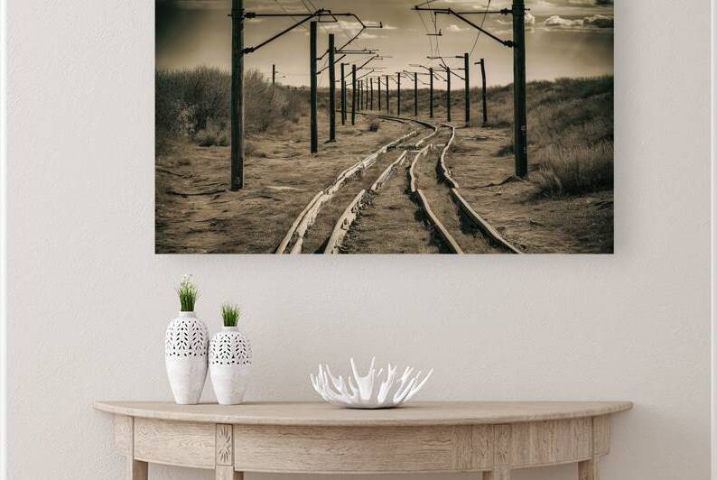 old railroad rails and poles with wires without a by Mirela Poiana