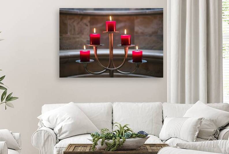 A captivating photograph of a metallic candle hol by Mariana Tirca