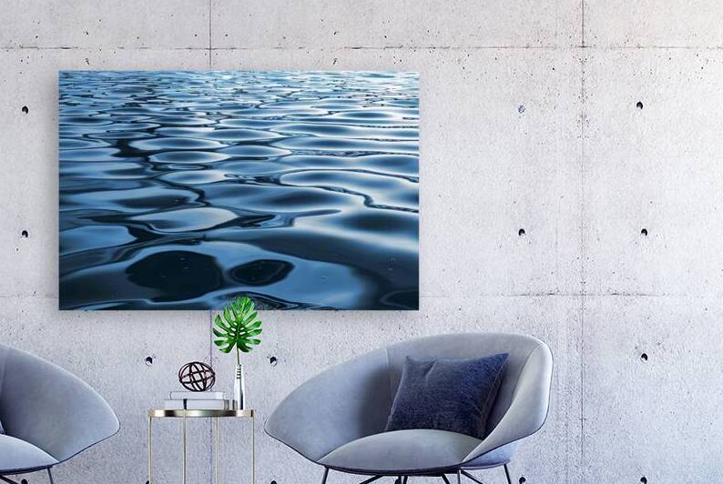 vast expanse of water reflecting a deep rich blue by Mitica Mihaila