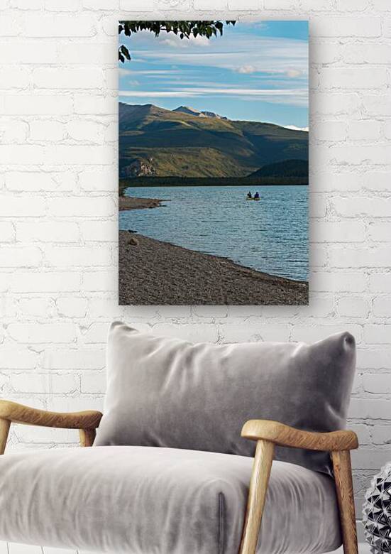 Canoe in the lake at Muncho Lake Provincial Park British Columbia Canada by David Reinhold