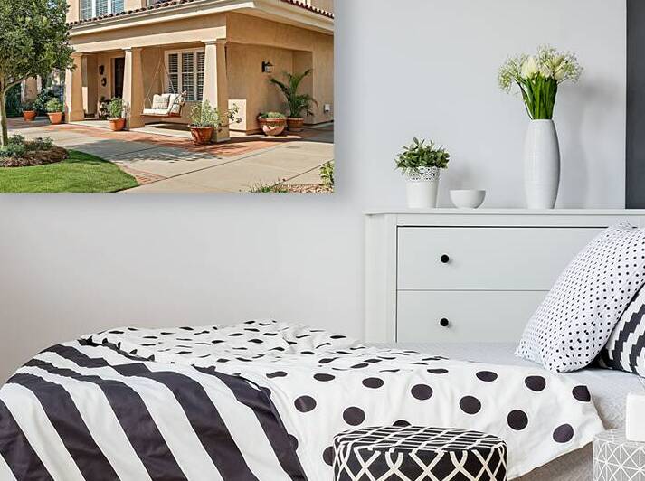 A residential house with a beige exterior by Petre Popescu