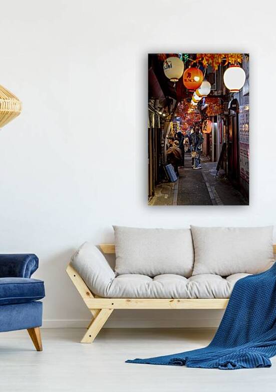 People walking in narrow street decorated with paper lanterns in by Gualtiero Boffi