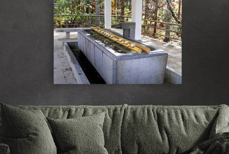 Japanese temizuya fountain providing water for ritual cleansing  by Gualtiero Boffi