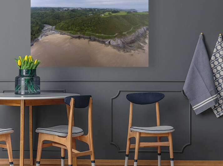 Aerial view of Caswell Bay car park and shops by Leighton Collins