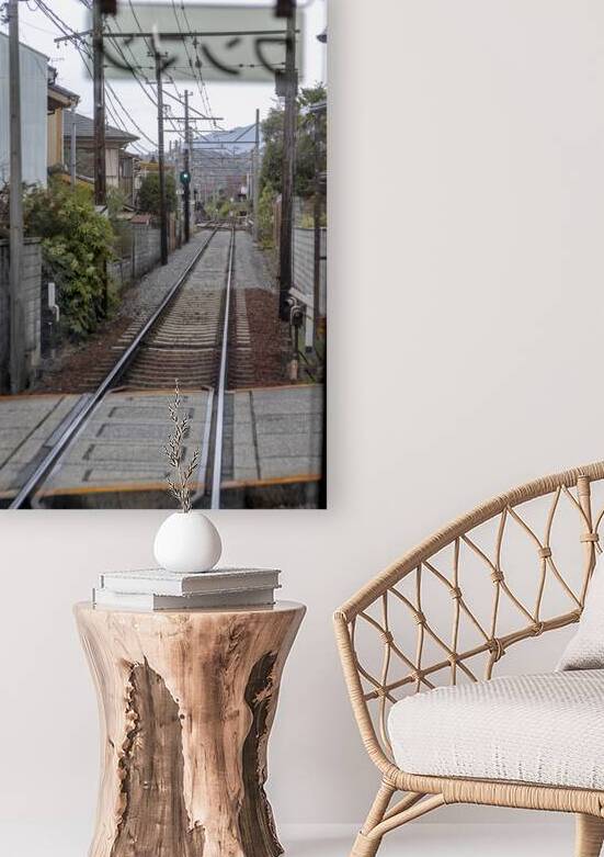 Train approaching empty rural japanese train station platform by Gualtiero Boffi
