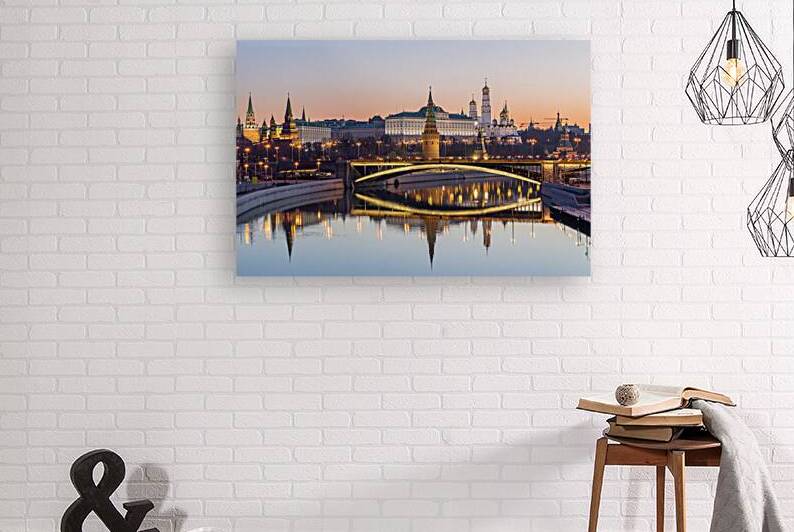 Illuminated Moscow Kremlin and Moscow river in summer morning. Pinkish and golden clear sky. Russia by Maksim Zabarovskii