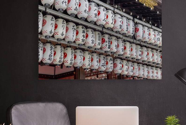 Rows of japanese lanterns hanging in a shinto shrine by Gualtiero Boffi