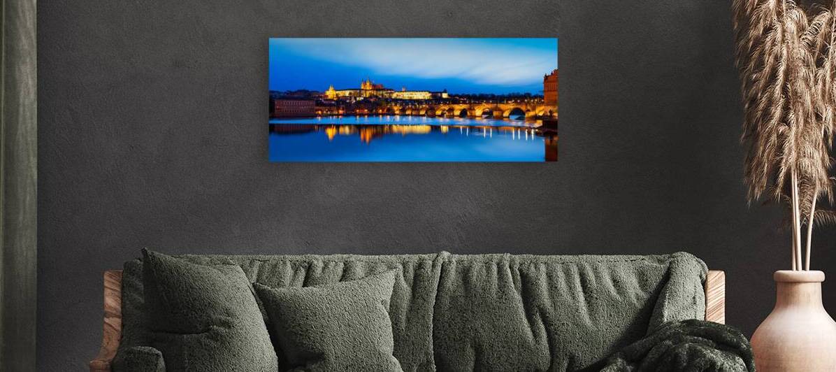 View of Charles Bridge Karluv most and Prague Castle Prazsky hrad in twilight. Panorama by Dmitry Rukhlenko