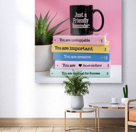 A photo of a black mug with the text by Kawtar el harda