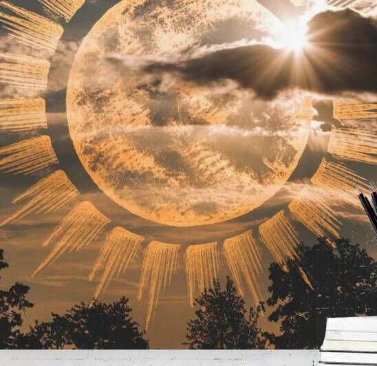 A large golden sun with rays extending outward by Kawtar el harda