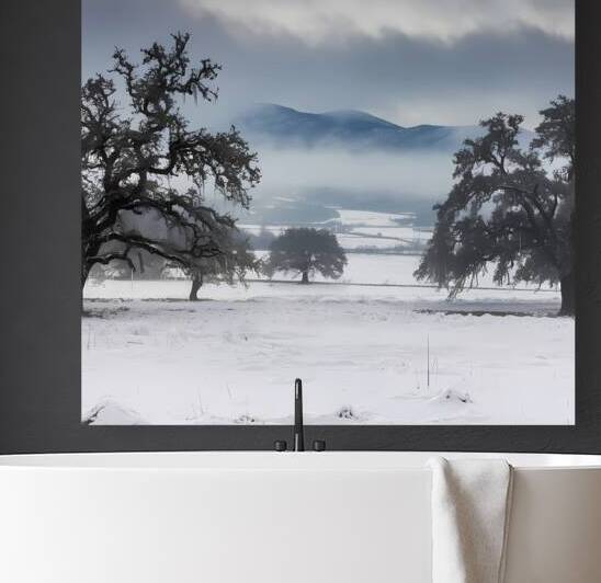 a photo of snowy plains with mountains on the horizon by rassam