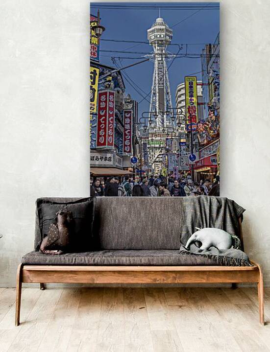 shinsekai district with tsutenkaku tower standing tall in the ba by Gualtiero Boffi