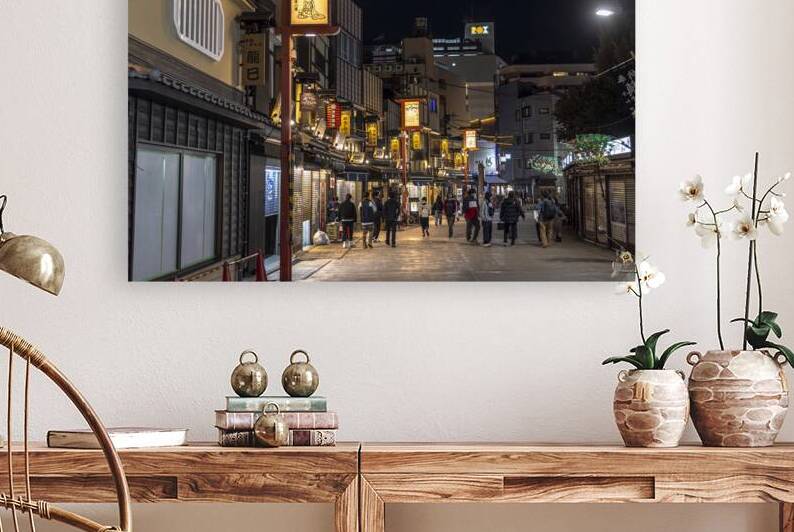 People walking down a street in asakusa tokyo at night by Gualtiero Boffi