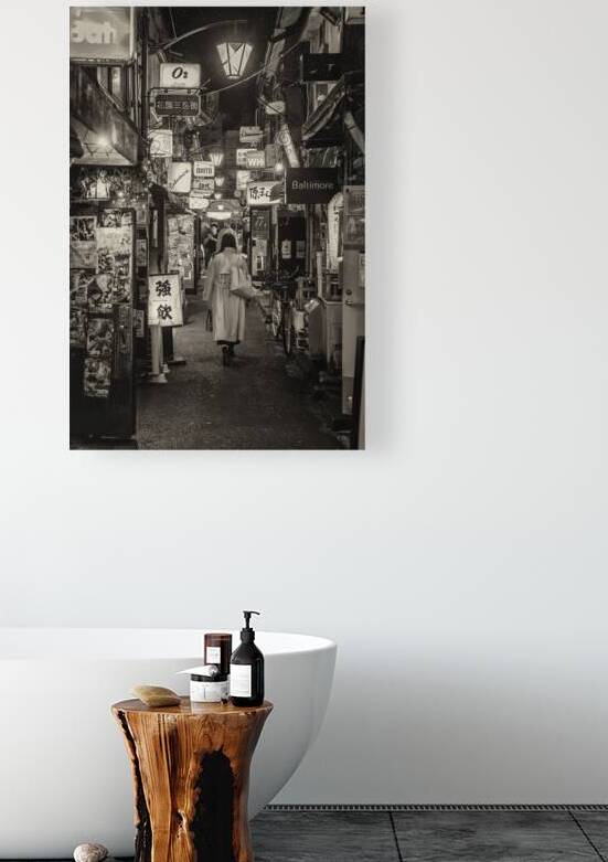 Woman walking through alley in shinjuku by Gualtiero Boffi