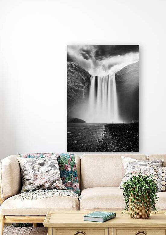 Lone tourist admiring majestic waterfall cascading from mountain by Gualtiero Boffi