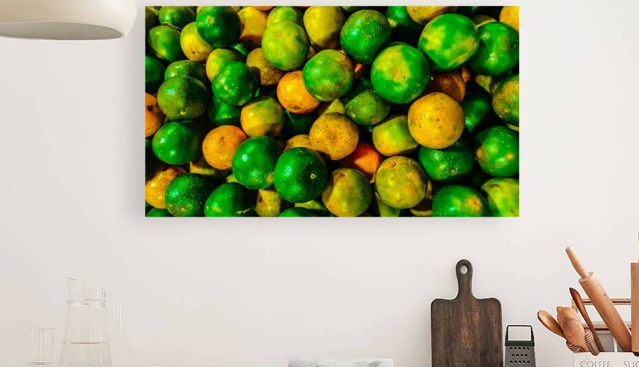 Fresh Citrus Fruits in Various Stages of Ripeness by urbancamshot