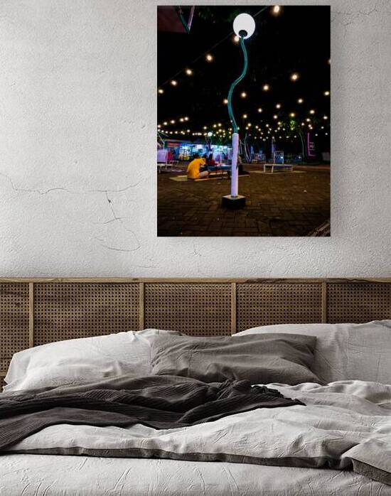 Nighttime Outdoor Gathering with Decorative Lights by urbancamshot