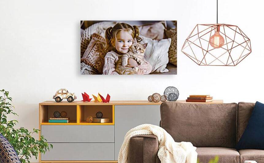 A little girl 5 years old blonde with two small ponytails in a by Ali Jaber