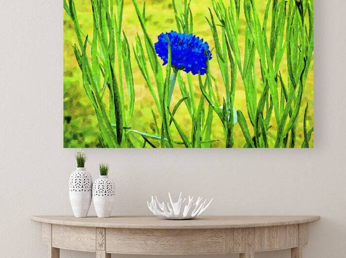 Vibrant watercolor painting of a cornflower in lush green foliage by Gestalt Imagery