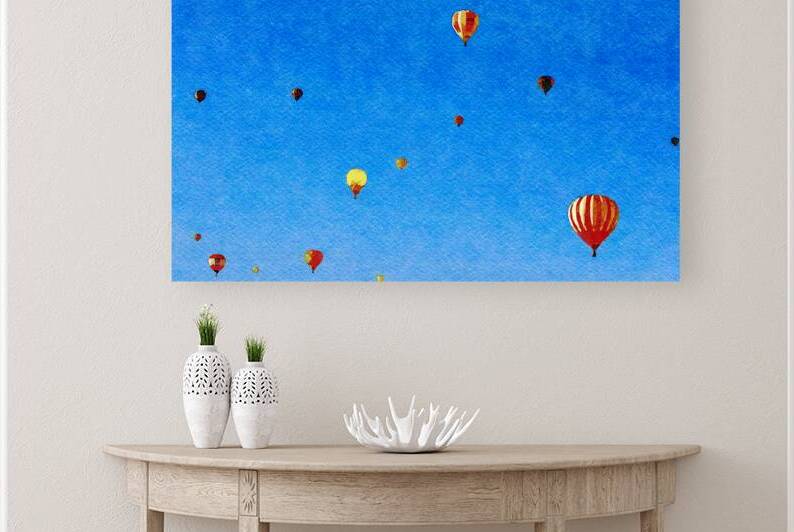 Watercolor artwork of hot air balloons floating in the sky by Gestalt Imagery
