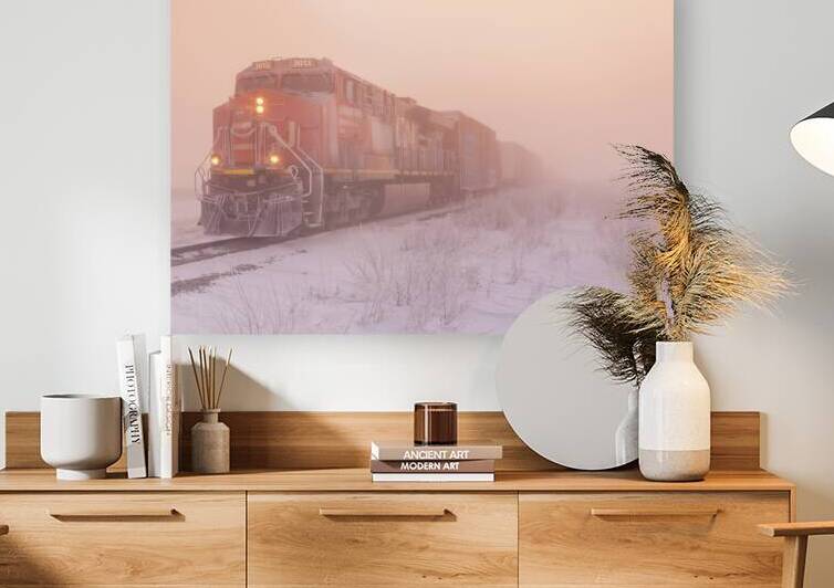 a locomotive pulling general freight  in winter by Dave Reede Photohgraphy