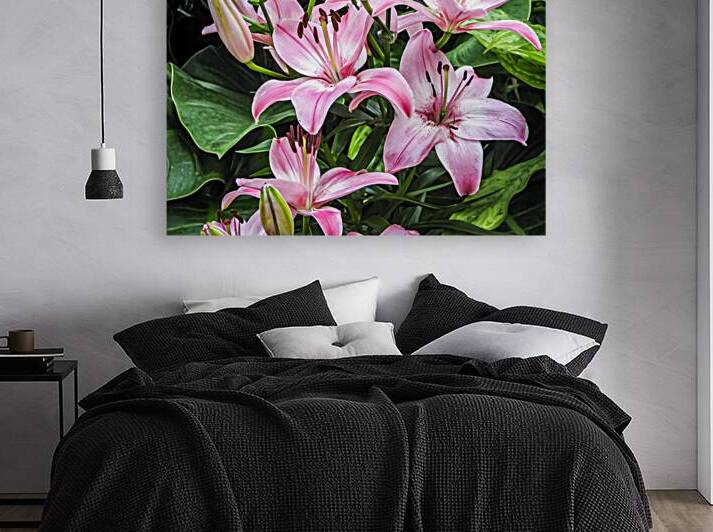 Close up of beautiful pink lilies in a lush garden setting by Gestalt Imagery