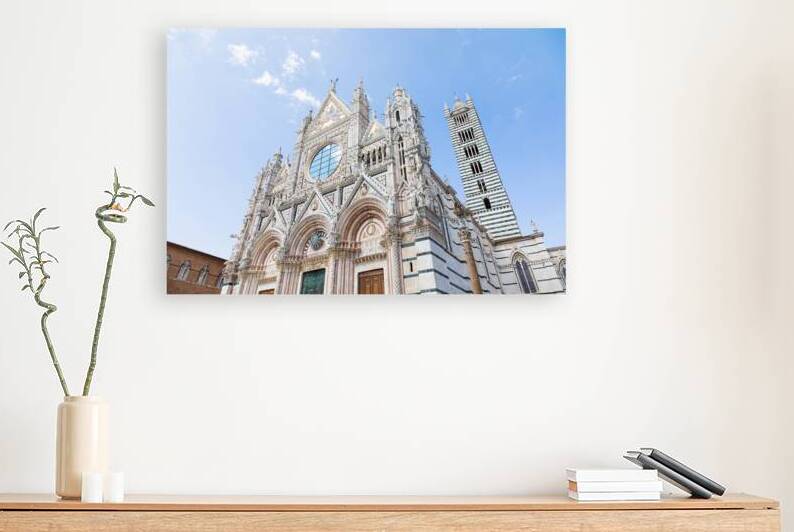 Siena cathedral in Italy. White marbles with blue sky famous la by Paolo Modena