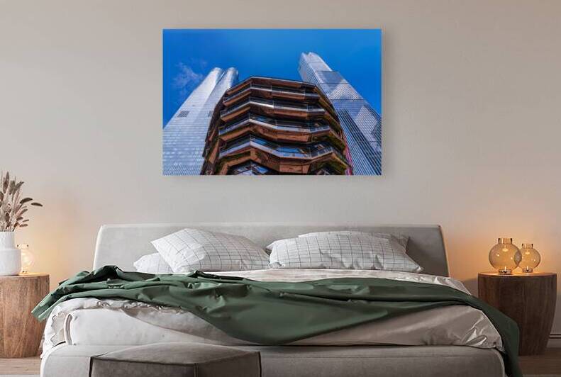 Reflective surface of the Vessel with a skyscraper behind with c by Steve Heap