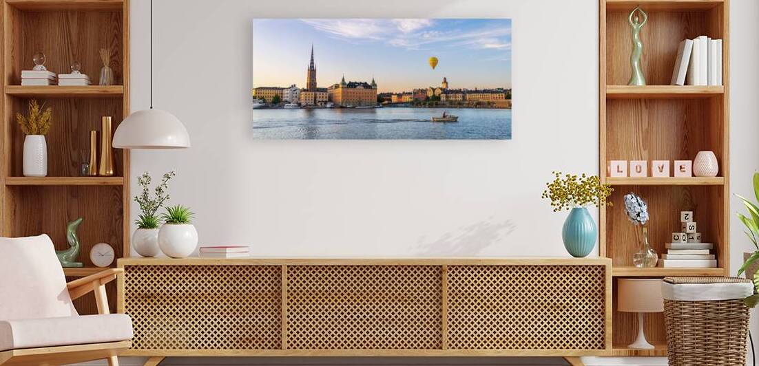 A boat passing by Riddarholmen Stockholm Sweden late summer evening by John Nilsson