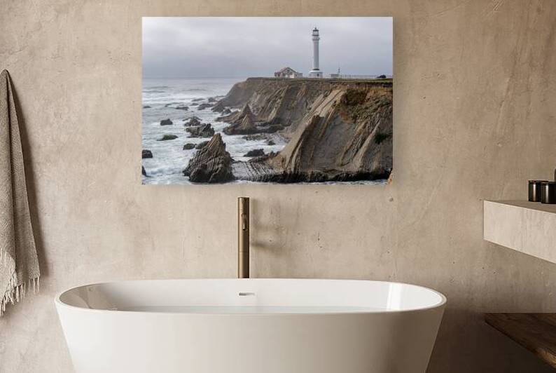 Point Arena Lighthouse with dramatic rocks by Lisa von Biela