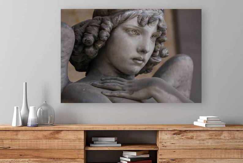 Guardian angel statue in antique cemetery. by Paolo Modena