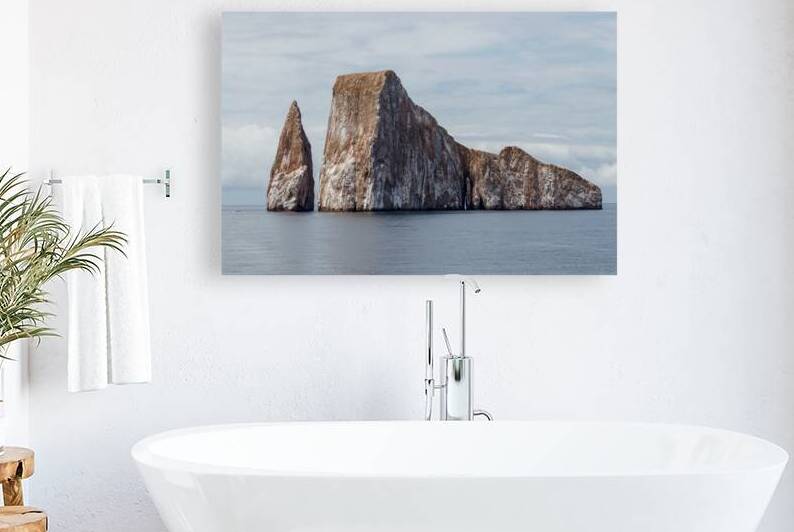 Kicker Rock or roca leon dormido sticking out of the ocean San Cristobal Galapagos by Ad Gr