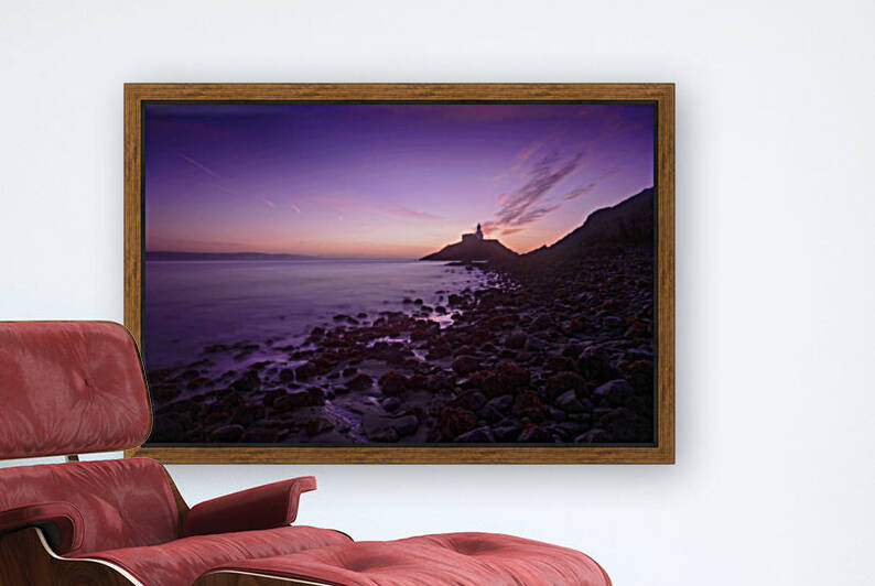 Daybreak at Mumbles lighthouse by Leighton Collins