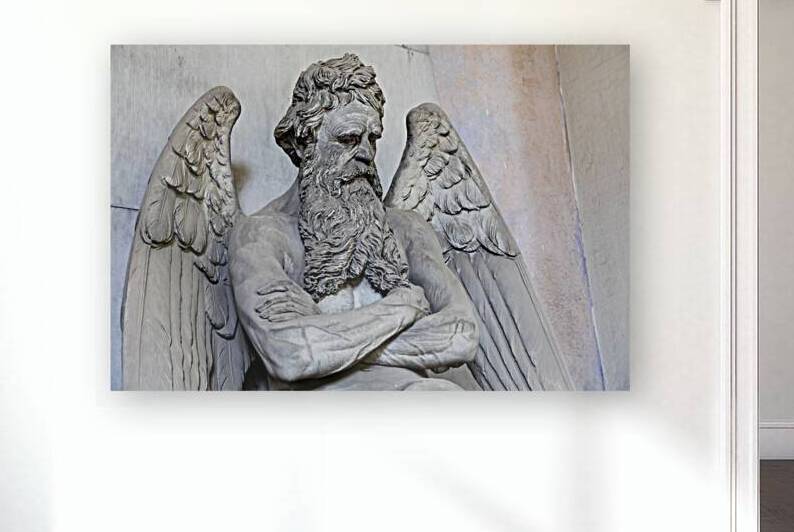 Old angel statue sitting on a tomb in contemplation. Memory and  by Paolo Modena