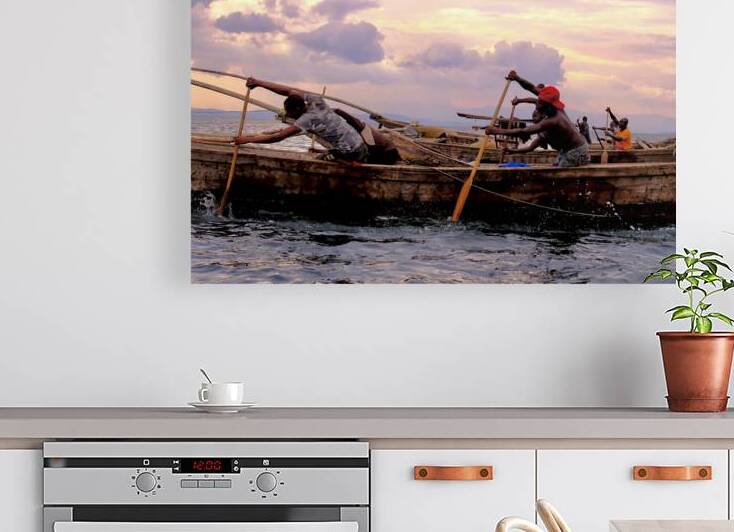 Night Fishers Paddling Out at Sunset by Rik Katz