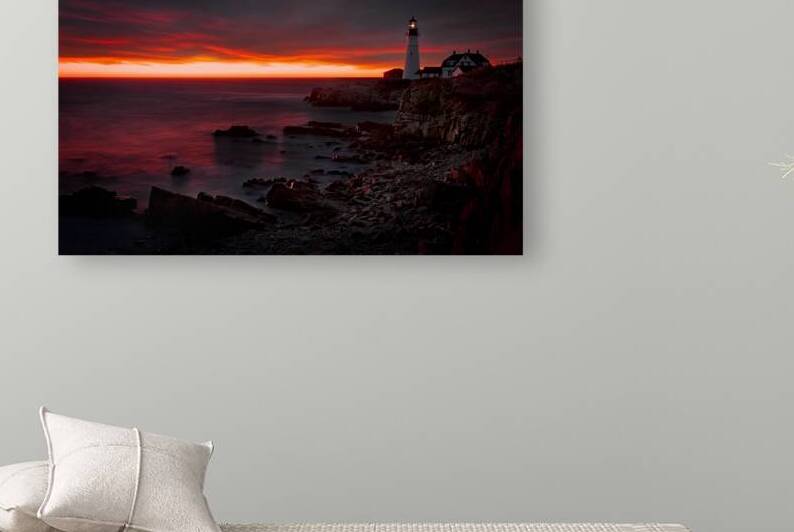 Crimson Skies Over Portland Head Light by Rick Berk