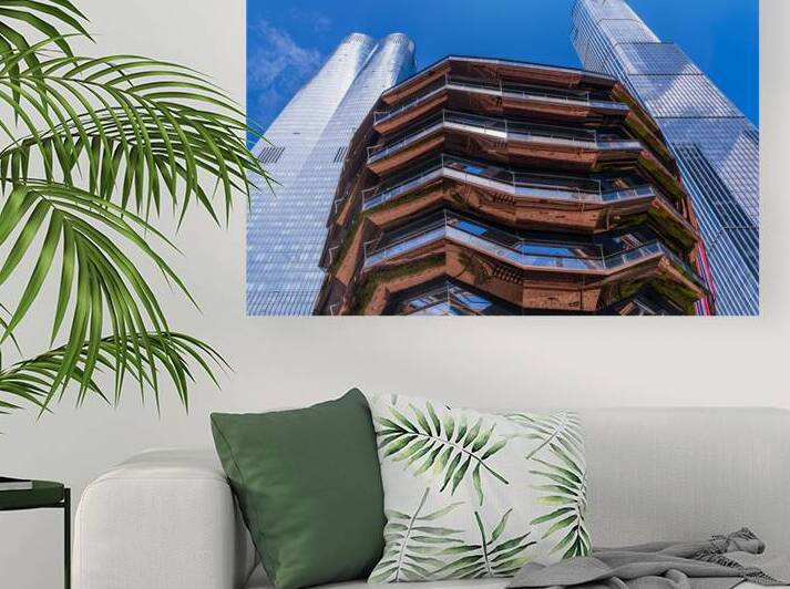 Reflective surface of the Vessel with a skyscraper behind with c by Steve Heap