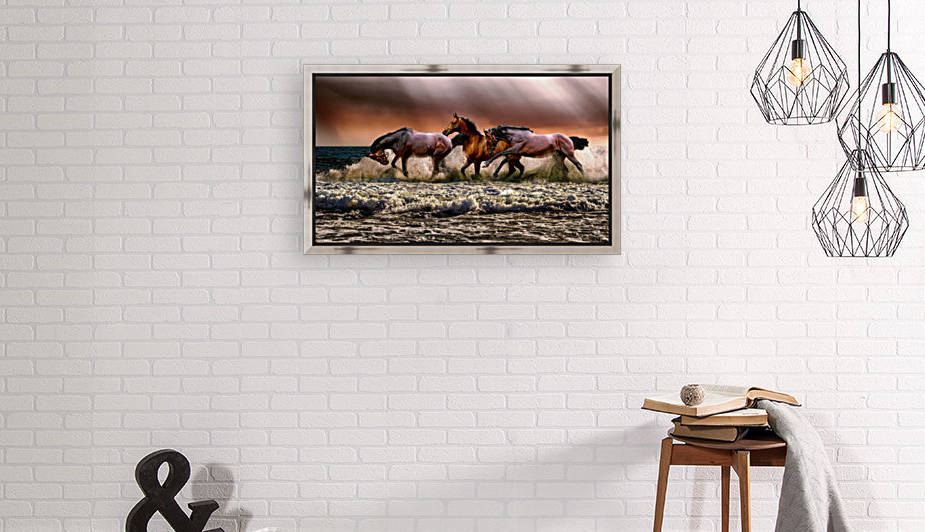 Photo of three galloping horses on body of water by Shamudy