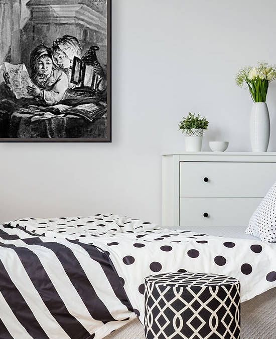 Boy and girl looking at drawings by Abraham van Strij