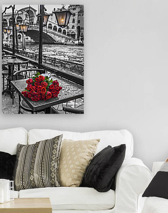 Bunch of red roses on street cafe table, Rialto Bridge, Venice, Italy by Assaf Frank