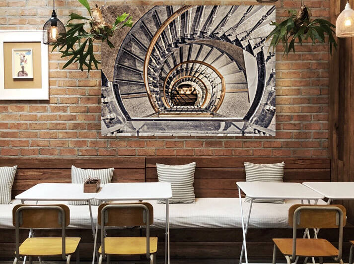 Spiral staircase from above in a building, Birmingham, UK by Assaf Frank