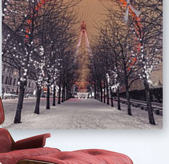 London Eye at night with trees in the foreground lit with lights and snow on the pathway, London, UK by Assaf Frank