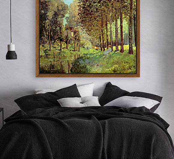 Resting on the river bank by Sisley