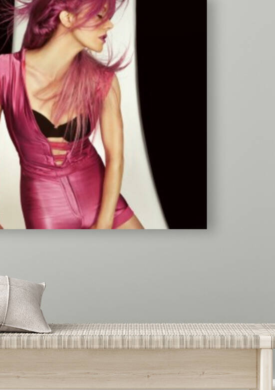 Portrait of a beautiful young woman in a pink one-piece jumpsuit holding a pink hair dryer in front of a black and white background her raspberry colored hair flying around by Artmood Visualz