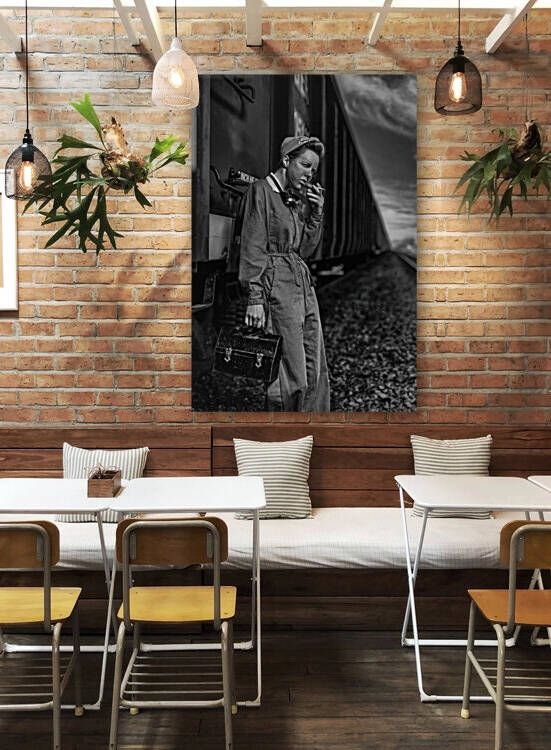 Vintage dirty female worker having her cigarette break leaning against a train wagon by Artmood Visualz