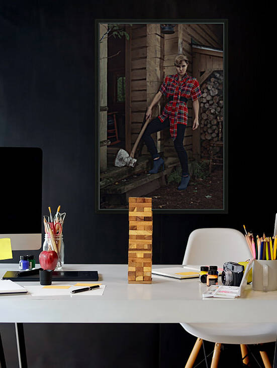 Beautiful young blonde woman with a curl in her hair wearing a long plaid shirt standing on the stairs of a rustic wooden shack an antique axe leaning against her leg by Artmood Visualz